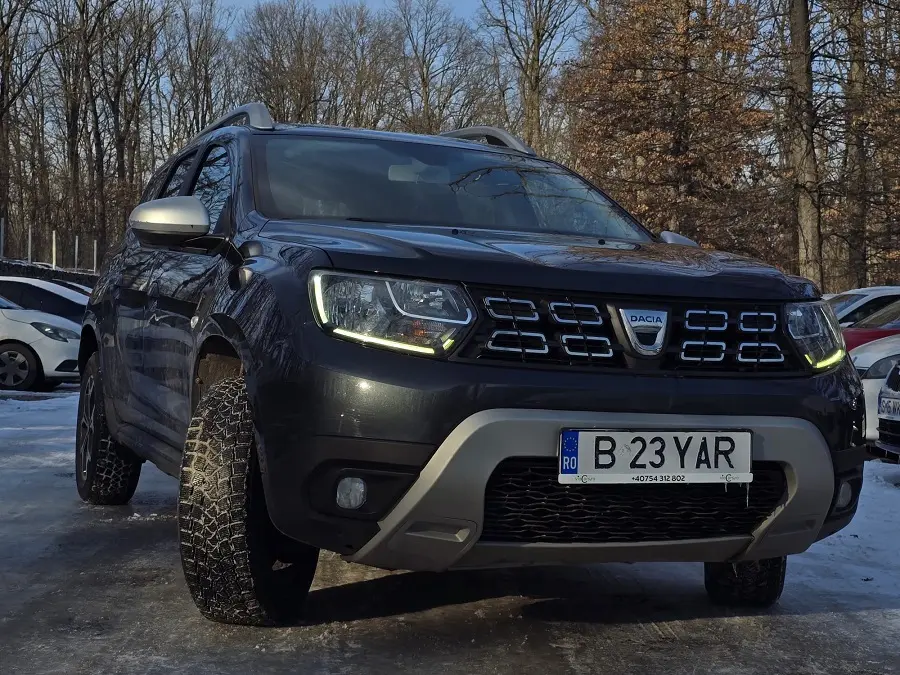 Dacia Duster 4x4 cu anvelope de iarna inchiriata de la Viocars